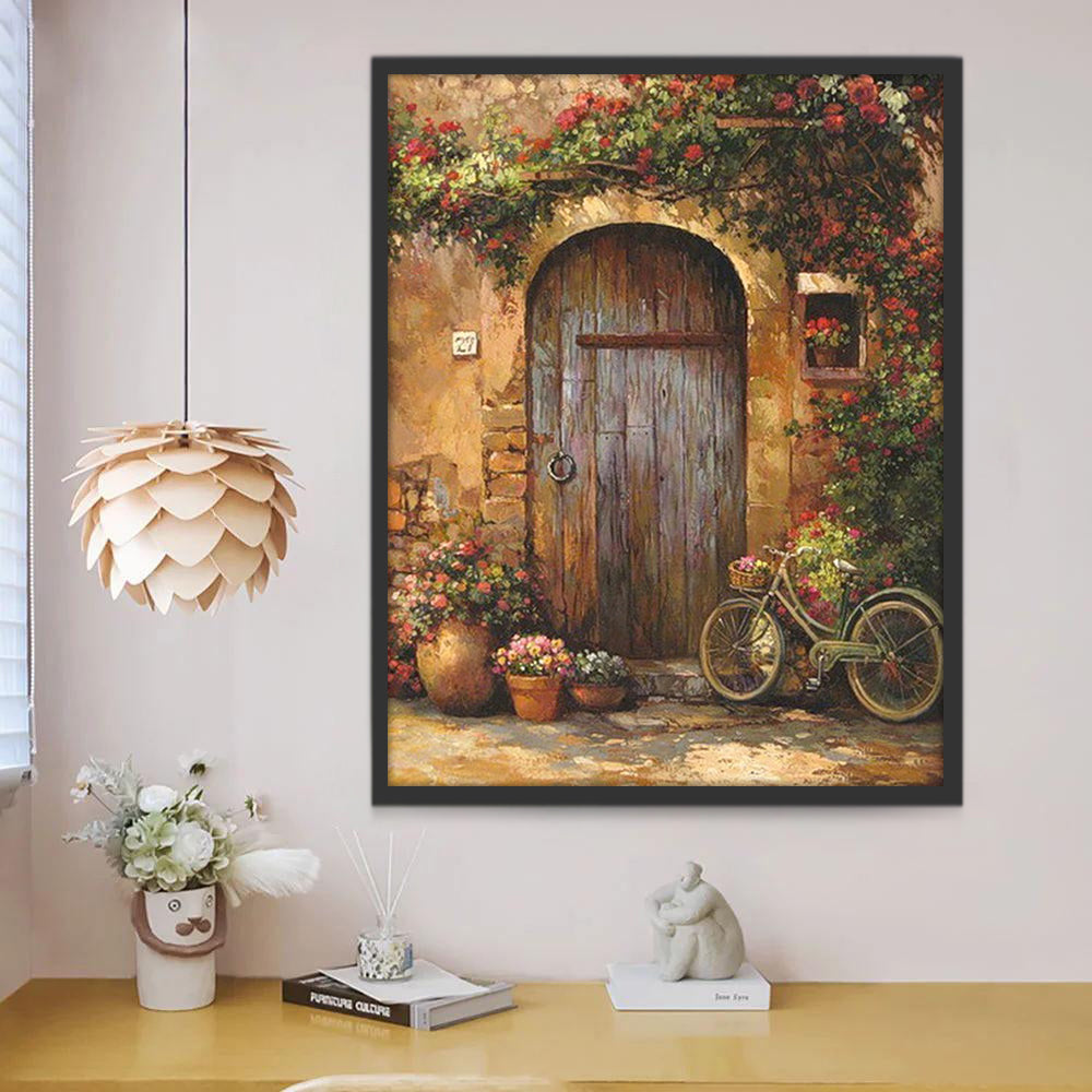 Een Oude Houten Deur Omringd Door Bloemen en een Fiets Schilderen op Nummers