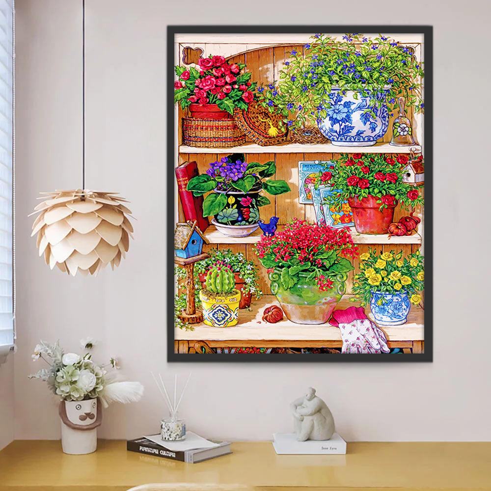 Een plank vol kleurrijke potbloemen Schilderen op Nummers