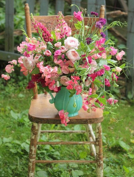 Kleurrijke Bloemen in een Groene Vaas op een Stoel Schilderen op Nummers