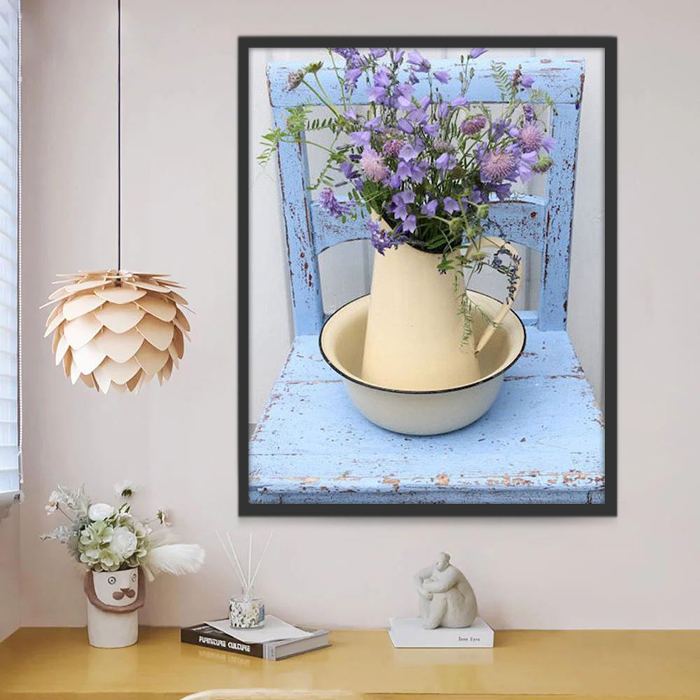 Paarse potbloemen op een blauwe stoel Schilderen op Nummers